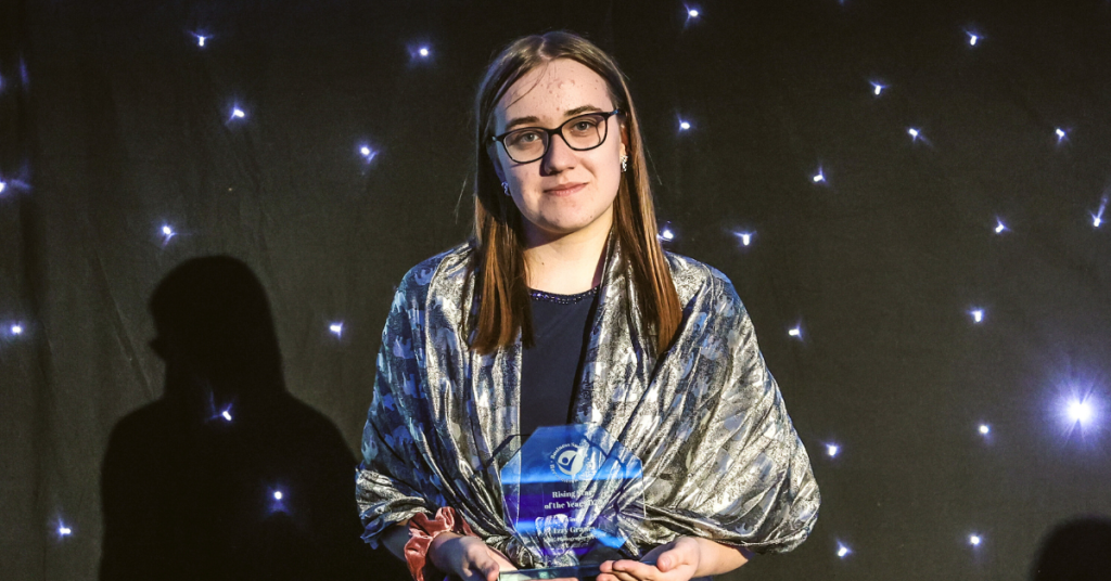 Izzy with her Rising Star Award